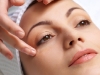 applying of vitamin treatment for facial skin in the beauty salon